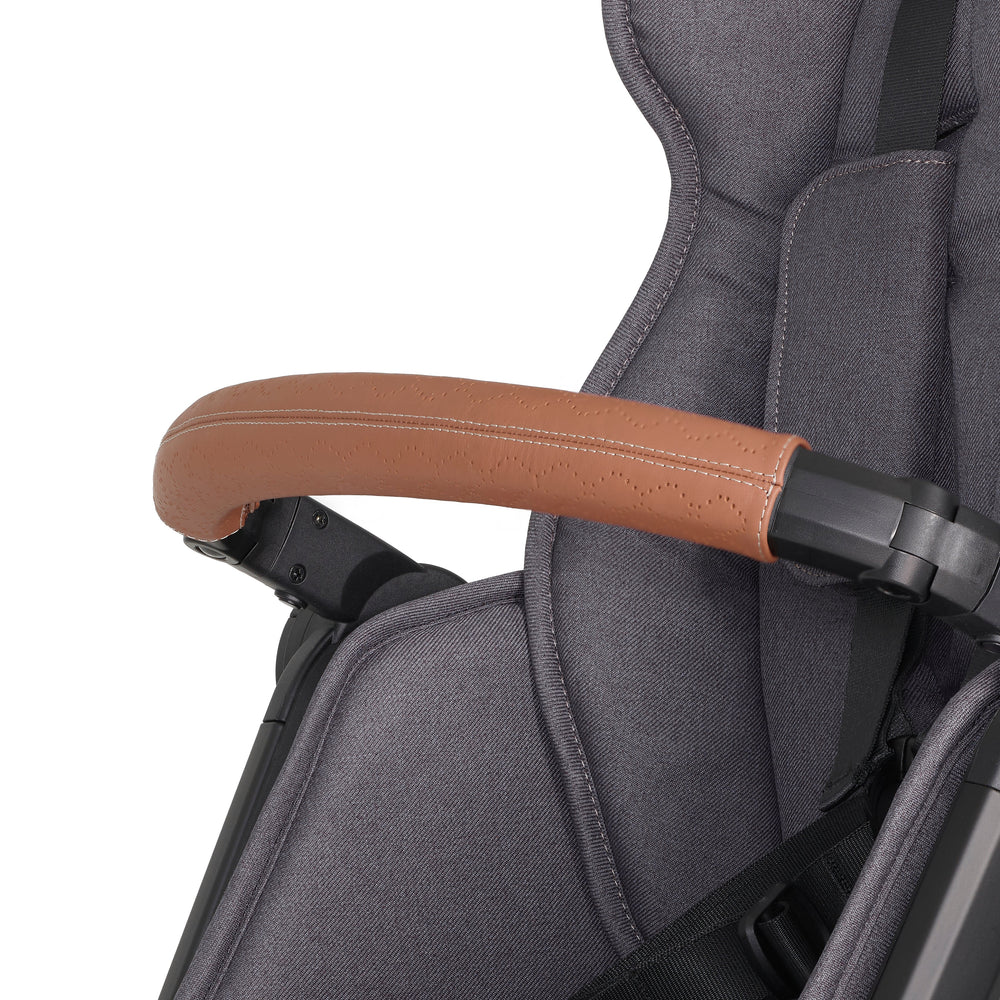 Leather Grip for Switchback Bumper Bar – brown bumper-bar grip attached to gray stroller seat