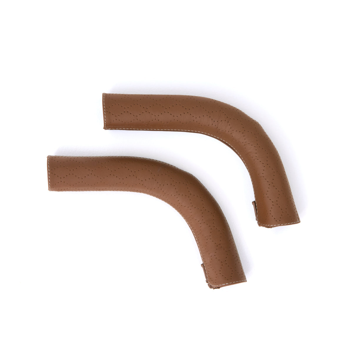 Leather Grips for Switchback – two curved perforated brown grips with white stitching
